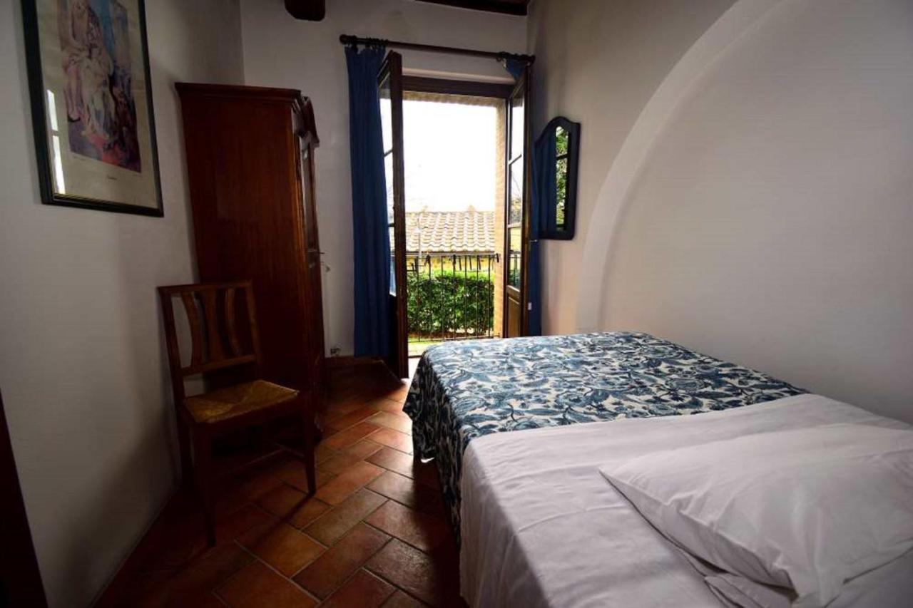 Le Rocche Di Valiano Aparthotel Bagian luar foto