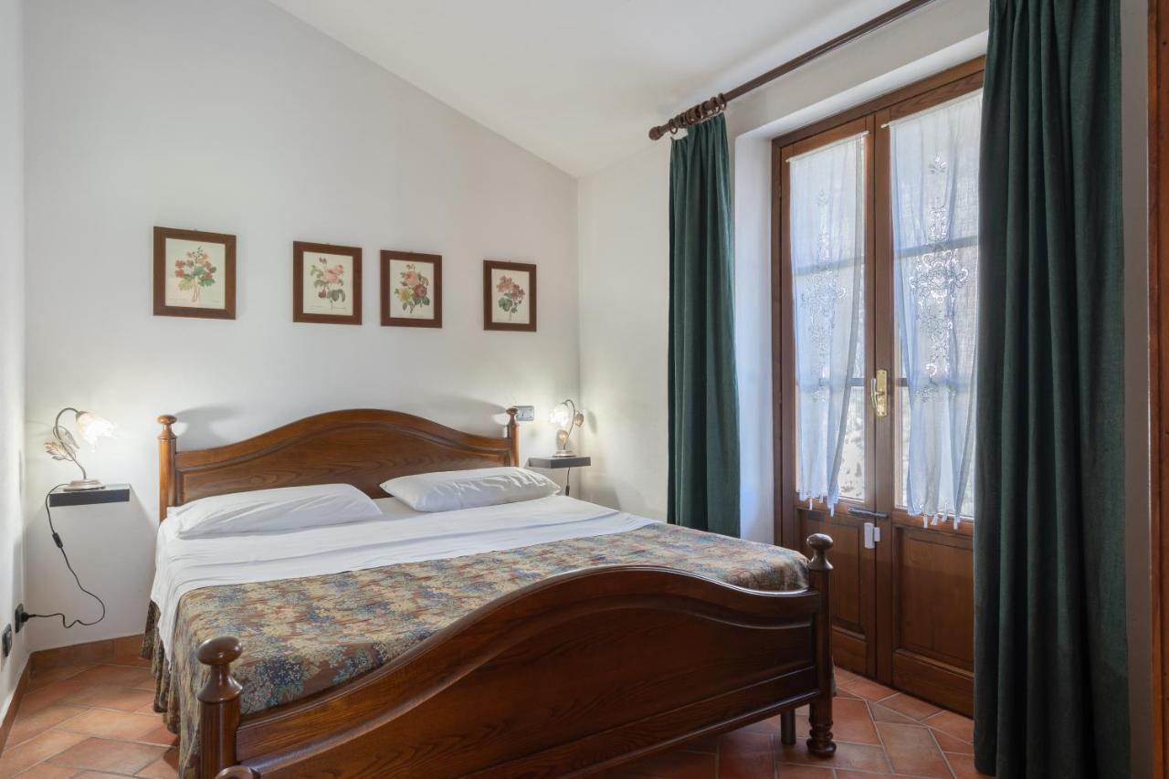Le Rocche Di Valiano Aparthotel Bagian luar foto
